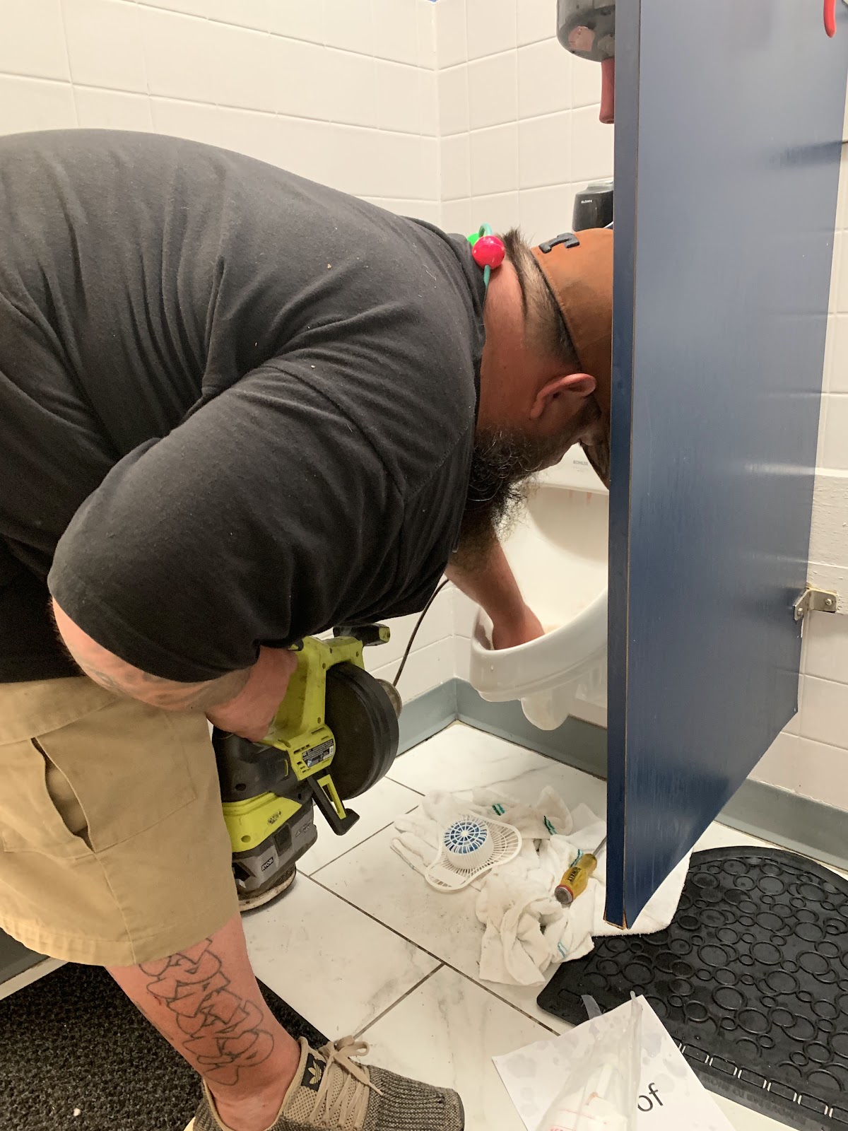 Pickell Plumbing servicing a commercial restroom fixture