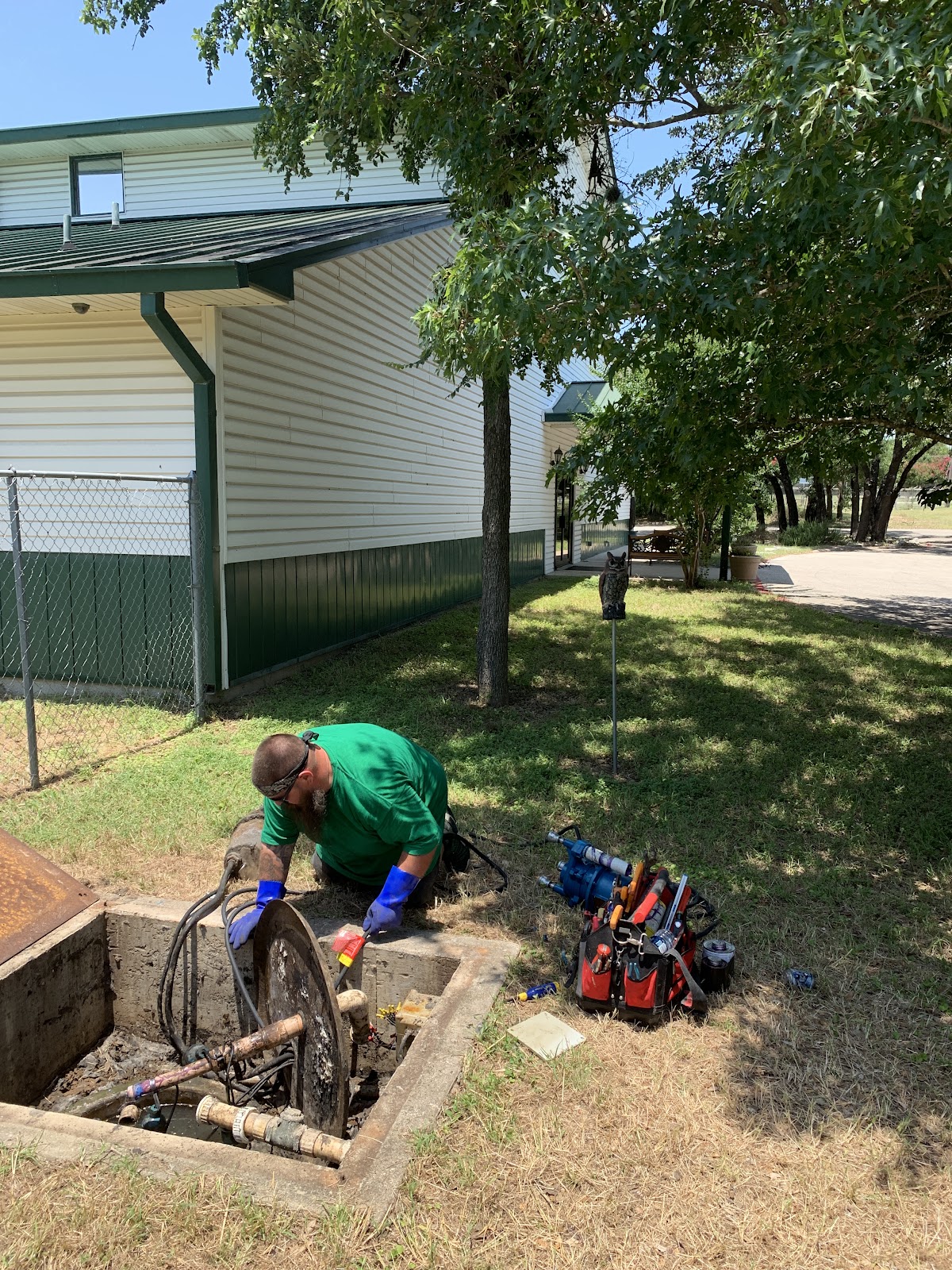 Pickell Plumbing technician repairing an outdoor water line